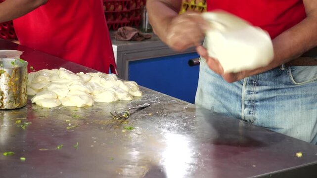 Filling Martabak Telor Pastry with Seasoned Egg and Minced Beef Mixture