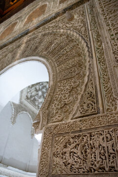 Ornate Carved Plaster Horseshoe Arch with Arabic Calligraphy Bands in Great Mosque of Tlemcen