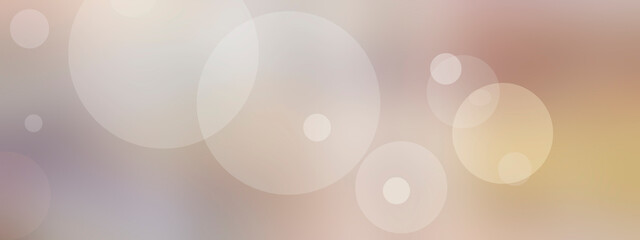 Abstract soft bokeh circles drift across a creamy pastel gradient background, creating a calm dreamy mood for backgrounds, branding, or digital design. © Sergei