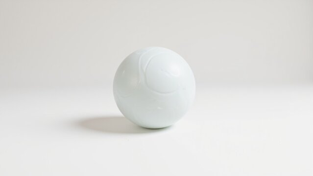 Studio Isolated White Perforated Floor Ball on Seamless Background