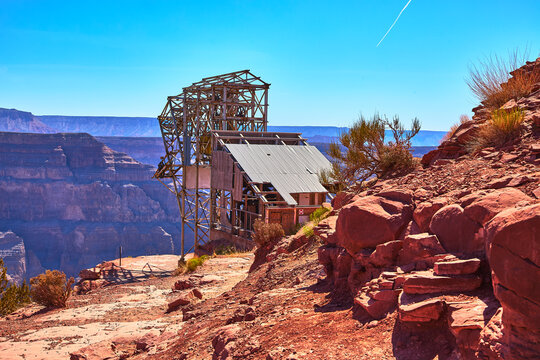 Abandoned Mine Structure on Red Rock Edge with Grand Canyon West in Arizona