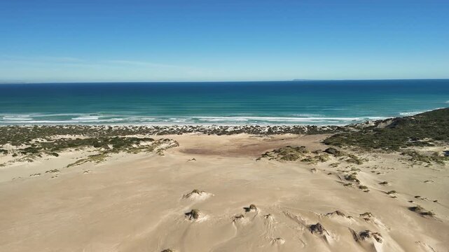 White Hut, Yorke Peninsula, South Australia &ndash; 4K aerial drone view of coastal dunes, native bushland and Daly Head Road Beach