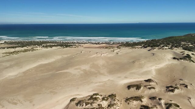 White Hut, Yorke Peninsula, South Australia &ndash; 4K aerial drone view of coastal dunes, native bushland and Daly Head Road Beach