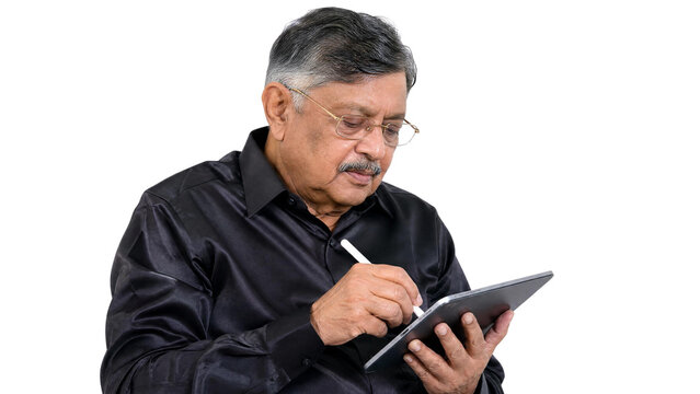 Senior Indian Professional Man Using Digital Tablet and Stylus Pen Isolated on Transparent Background