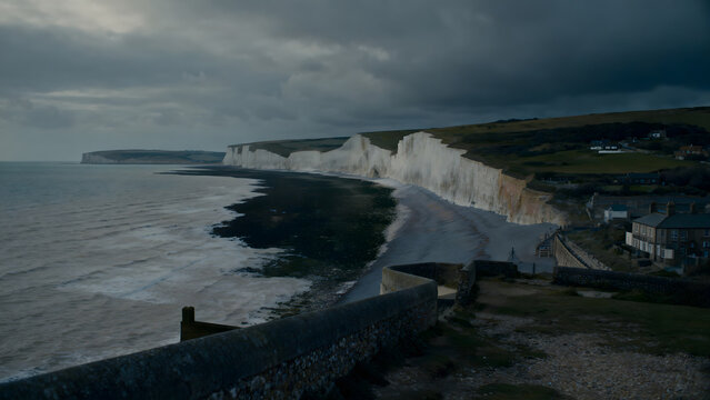 Dover white cliffs and expansive coastline, overcast weather, cinematic landscape.
