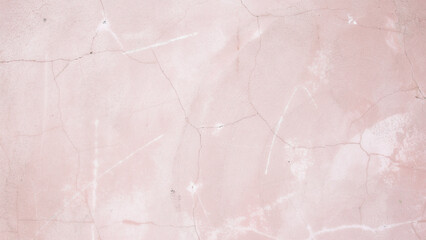 Fototapeta premium Pink concrete wall texture. Dusty rose cement background with weathered surface details.
