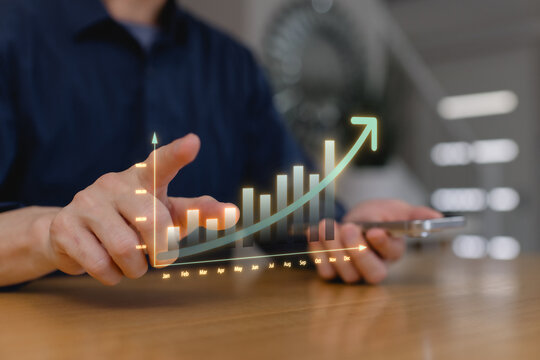 analyzing financial growth with virtual bar chart and upward trend graph, showcasing business performance, revenue increase, data analytics, investment strategy, and financial success.