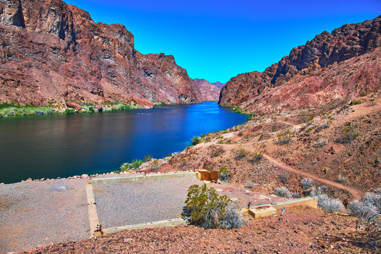 Abandoned Gauging Station Foundation Overlooking Colorado River and Desert Canyon