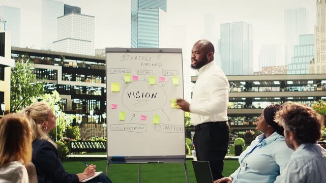 Business colleagues discussing action plan for metrics and business planning and with strategy notes business planning and with analytics and performance data.
