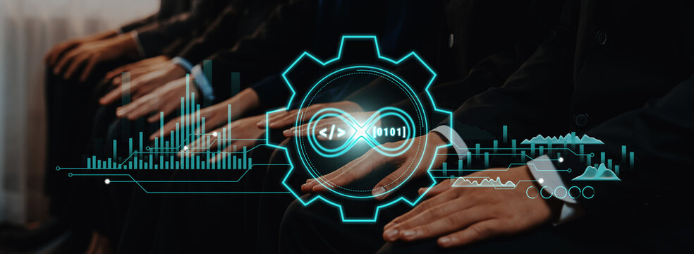Business professionals' hands engaged with a digital interface, showcasing elements of technology, innovation, and teamwork in a corporate environment. Trope