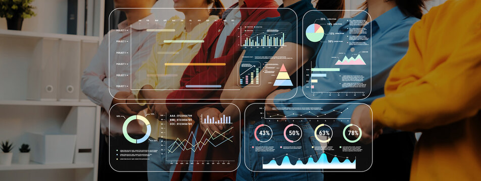 A diverse group of professionals stand together in a modern office setting while analyzing data visualizations, showcasing collaboration and business strategy development. Trope