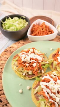 Mexican food. Delicious and crispy chicken tinga tostadas
