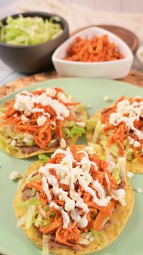 Traditional Mexican dish. Tostadas de pollo con crema y queso