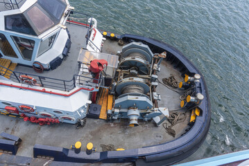 Close overhead photograph of a tugboat highlighting the vessel's superstructure, bridge and operational deck equipment. Marine support services in the Panama Canal. © Mariusz