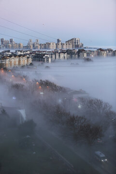 City buildings at foggy sunrise in Istanbul, Turkey.