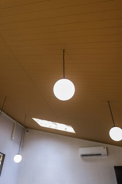 Modern lamp on the ceiling in living room at home,Interior design of dining room,house interiors,Space for text.