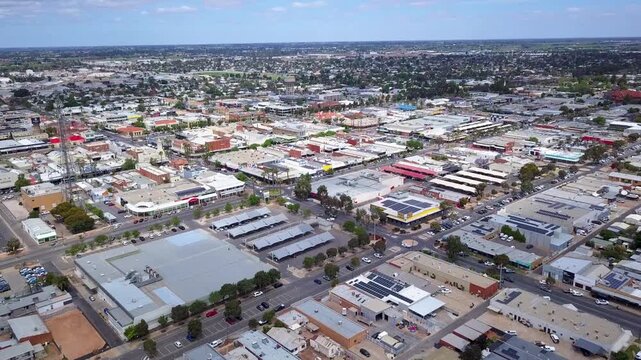 Aerial panorama of Mildura's Central Business District with palm-lined streets, heritage buildings, and busy shopping precinct in regional Australia - DLOG Flat File 4K