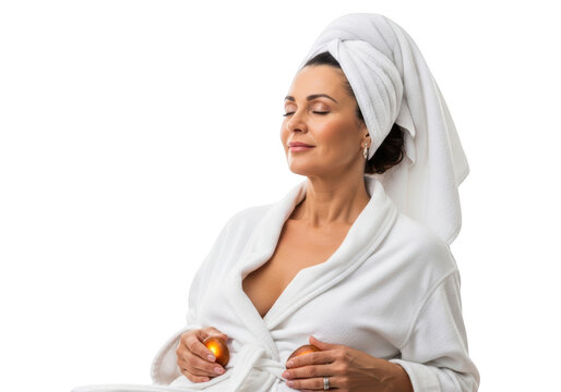 Woman in white bathrobe and towel.