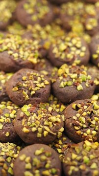 Making cookies with pistachios in a bakery
