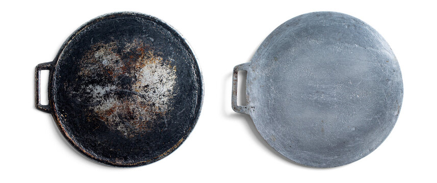 Round cast iron budare cooking plate for arepas with front and rear views isolated. Authentic venezuelan cookware