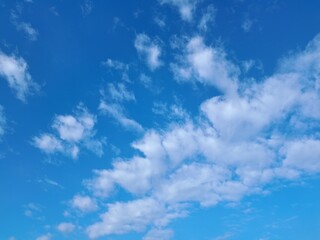Obraz premium Blue Sky with White Clouds Background