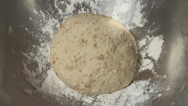 Circle Bread dough after kneading put  in mixed bowl for proofing