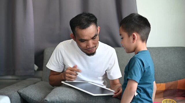 Father and son Magnetic Drawing Board makes learning and education fun for kids.