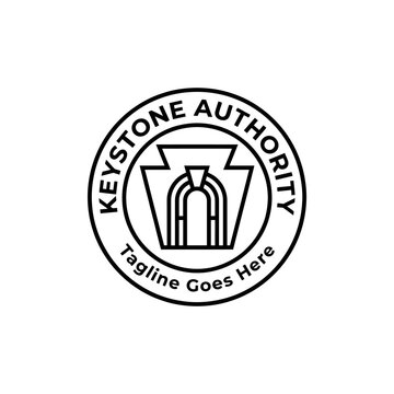 Circular badge featuring a keystone arch for construction and heritage. Signifies foundation and strength.