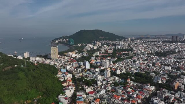Aerial view of Vung Tau Ward, Ho Chi Minh City, Vietnam, featuring the Martyrs Monument, Bau Sen Lake and Big Mountain amid the scenic urban landscape of this coastal city.