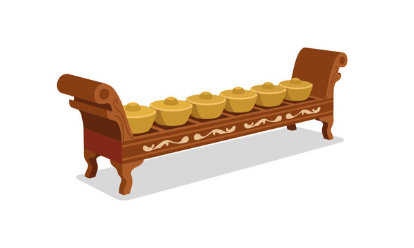Traditional Indonesian gamelan bonang musical instrument with ornate wooden frame and bronze gongs.