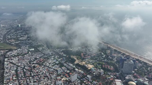 Aerial view of Vung Tau Ward, Ho Chi Minh City, Vietnam, featuring the Martyrs Monument, Bau Sen Lake and Big Mountain amid the scenic urban landscape of this coastal city.