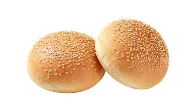 Two delicious golden brown hamburger buns covered with sesame seeds isolated on white background