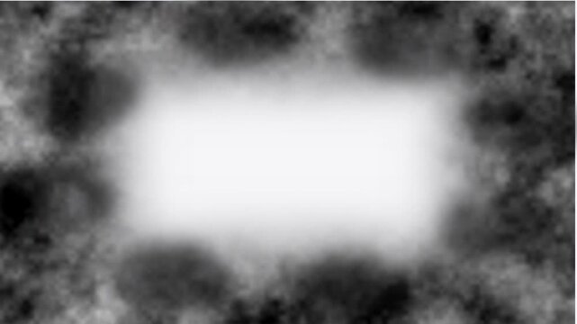 Animated smoke frame revealing copy space, soft black fog borders create dramatic atmosphere