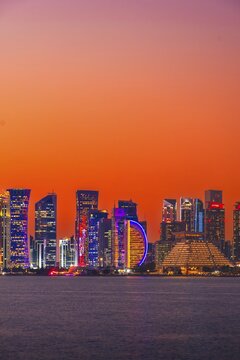 Doha, Qatar - january 8th, 2026: Doha skyline at night from the Corniche. Iconic illuminated skyscrapers business district luxury middle east gulf colorful night architecture