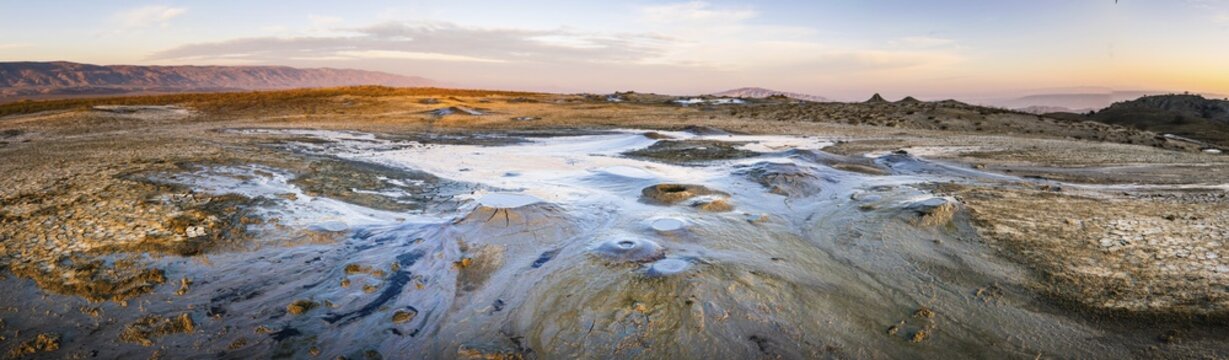 Wide panoramic view of Chachuna mud volcanoes with vibrant colors.Georgia