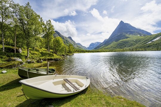Rowing boats on the shores of Lake Litlvatnet, Innerdalen High Valley, Innerdalst&aring;rnet Mountain Area, Sunndal, M&oslash;re og Romsdal, Vestlandet, Norway