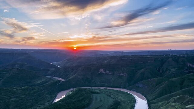 Aerial Sunset Time-lapse Over Winding Jing River Meander In Loess Hills, Shaanxi, China.