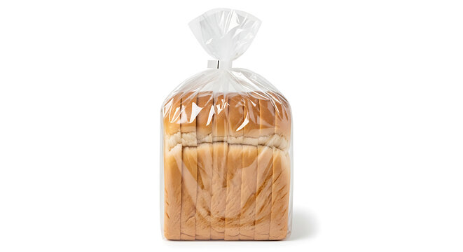 Whole loaf of rustic bread on paper bag