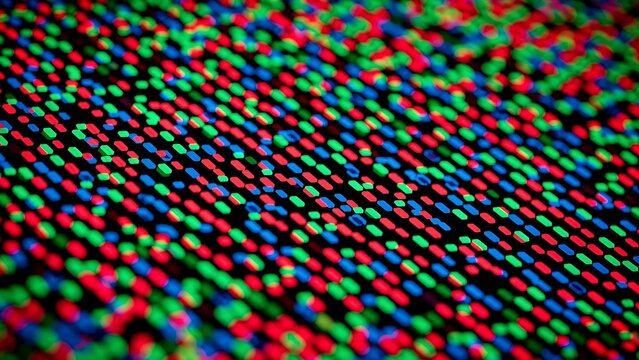 Macro view of red green and blue subpixels on a digital display screen