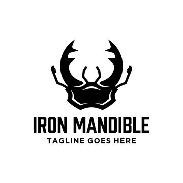 Strong stylized beetle mandible symbol for heavy-duty, power, or automotive performance brands.