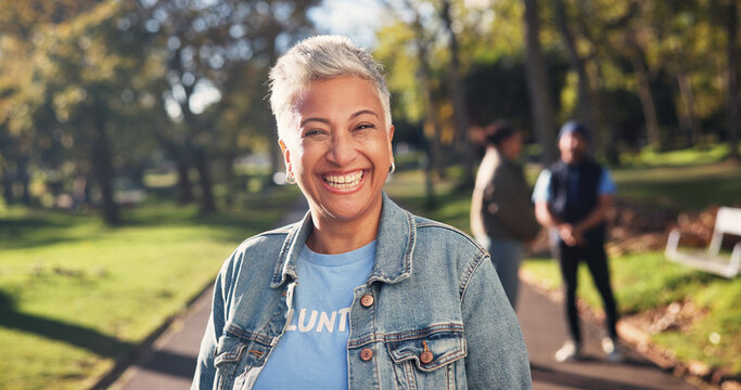 Volunteer, mature and portrait of happy woman in park for climate change, sustainability and charity. Nature, smile and person with environmental campaign, community service and eco friendly ngo
