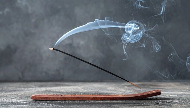 Incense smoke wisp for spa wellness. Zen meditation background with aromatic burning stick.