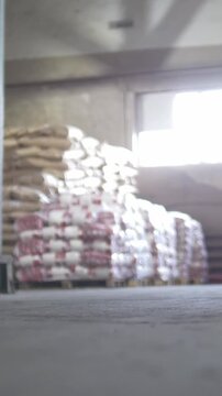 Autoloader loading goods in industrial warehouse