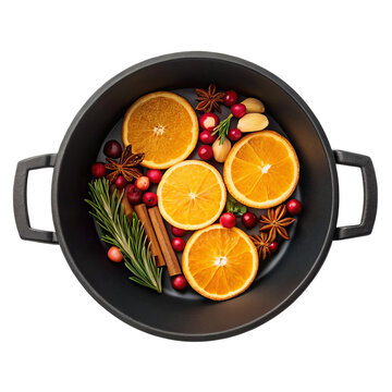 Cast iron pot filled with fresh orange slices cranberries cinnamon and star anise for seasonal potpourri recipe layout
