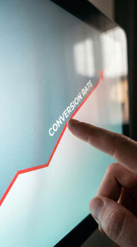 Conversion rate growth strategy with finger touch on screen for e commerce business analysis and sales increase