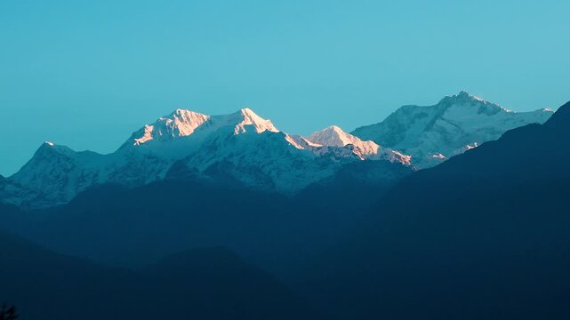 Early morning sun rases shining at Kanchenjunga mountains