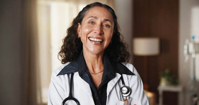 Doctor, laugh and woman in hospital for healthcare, wellness service and career experience in clinic. Portrait, mature female person and medical professional, funny physician and general practitioner