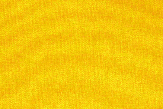 Yellow fabric cloth texture for background, natural textile pattern.