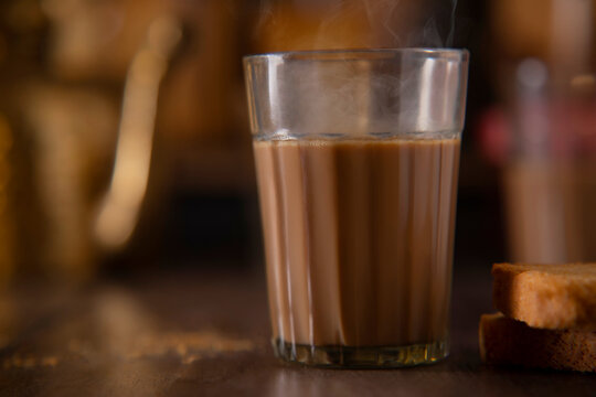 Ruska kept next to a glass filled with tea on a tea stall