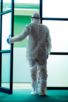 Doctor going in the ward to attend patients